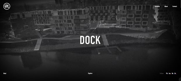 Igor Starodub's video slider, with a black and white image of some buildings by the ocean behind the word 'Dock'